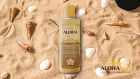 Aloha Sun 8 fl oz bottle in hand showing compact travel-friendly size