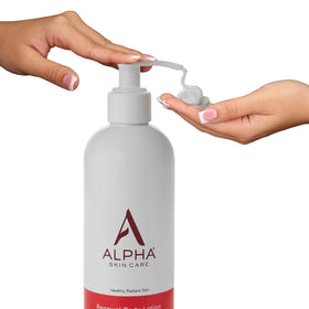 Alpha bottle held in hand to show 12 oz scale, helps visualize product size