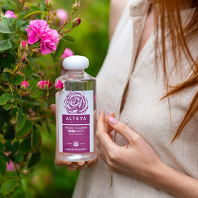 Bathroom shelf with Alteya Organics rose water demonstrating everyday skincare use
