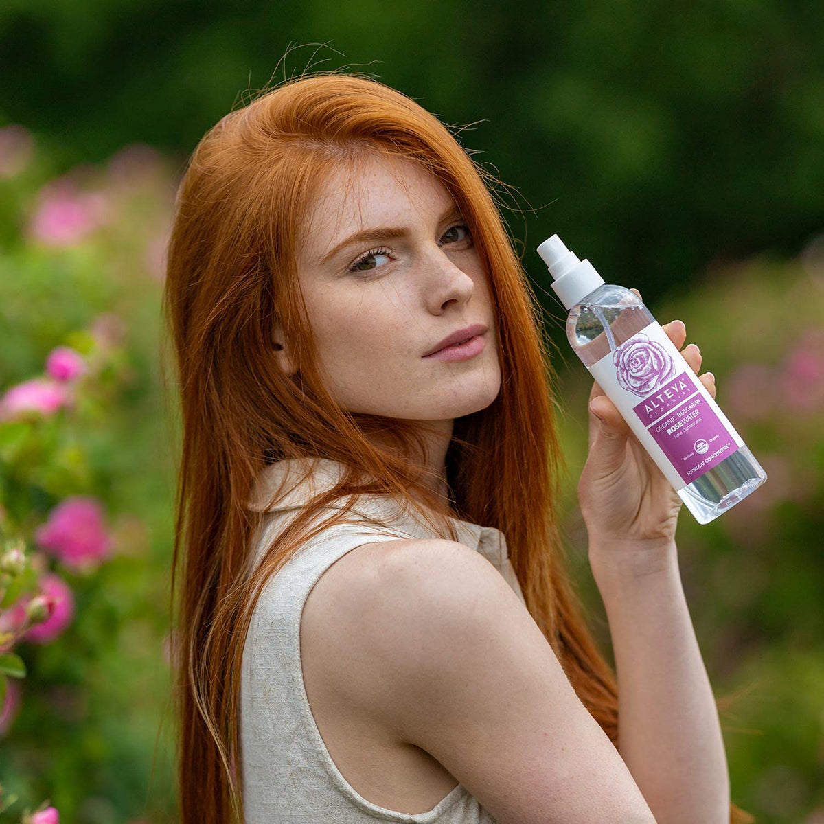Alteya Organics misting hair to refresh curls and add light conditioning benefit