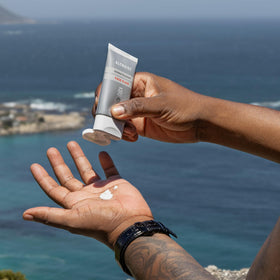 Altruist SPF50 being applied to hand showing even coverage and fast absorption benefit
