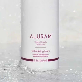 ALURAM label close-up highlighting algae extract, biotin, karanja oil