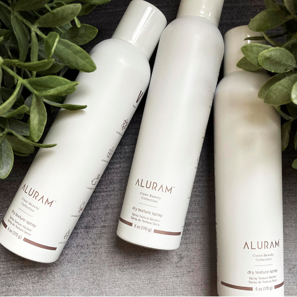 ALURAM nozzle close-up highlighting fine mist for even, lightweight texture distribution