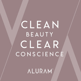 ALURAM bottle in shower setting conveying clean-beauty routine benefit