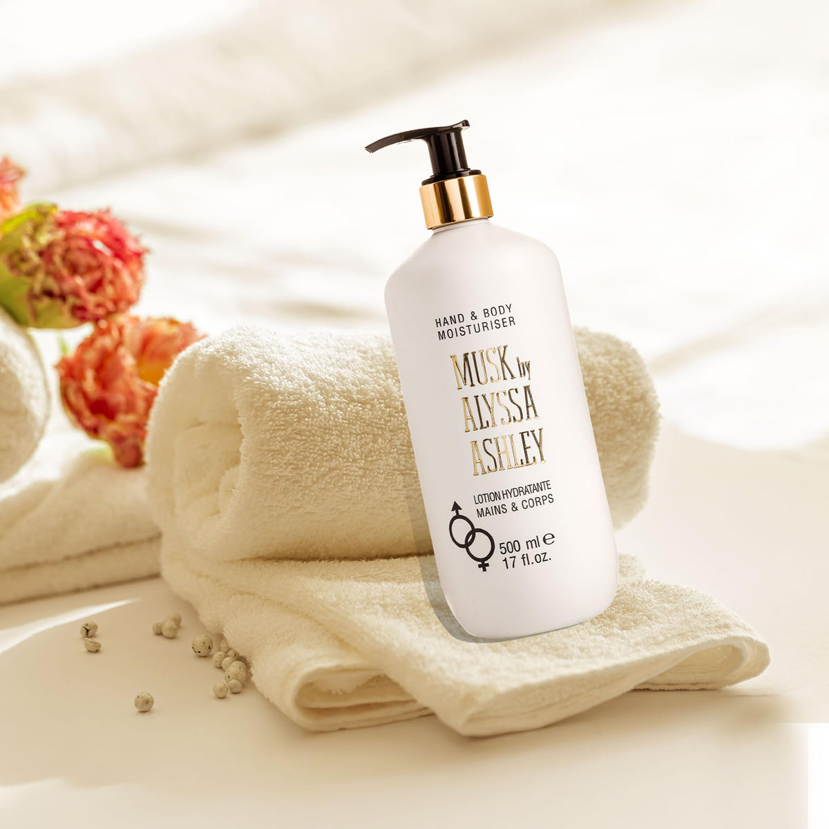 Alyssa Ashley lotion on hand close-up highlighting smooth texture and hydration
