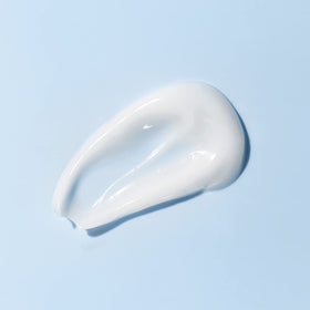 Amazon Basics open jar revealing cream inside, showing generous 16-ounce supply