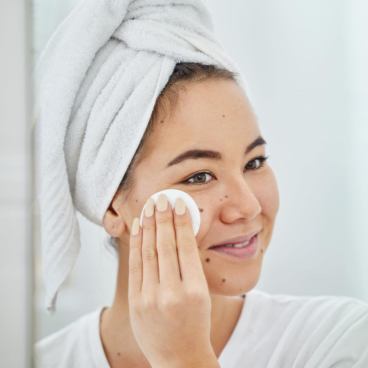 Amazon Basics products lined up to show cleanser, toner, treatment sizes