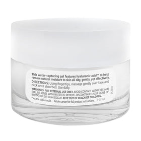 Amazon Basics jar beside common items showing compact 1.7 oz travel-friendly size