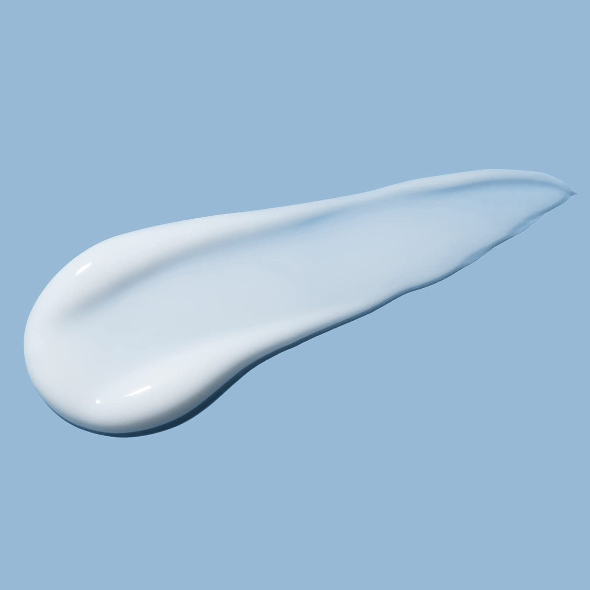 Amazon Essentials application on hand illustrating fast absorption and moisturized skin