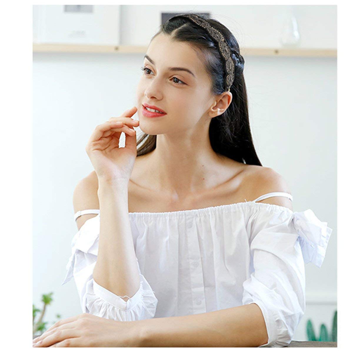 AMCAMI headband worn as bracelet showing dual-use convenience