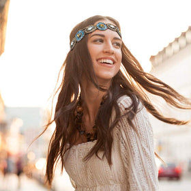 AMCAMI headband in hand showing scale and wearable size