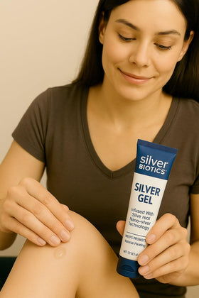 American Biotech Labs tube next to common object showing 4 oz size and travel convenience