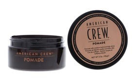 American Crew product in hands being warmed for even distribution and easier styling