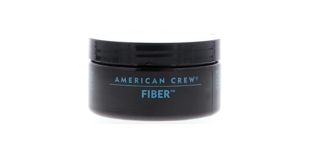 american crew product on hands being warmed for even application and smoother styling