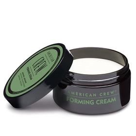 American Crew jar on bathroom vanity depicting everyday grooming routine