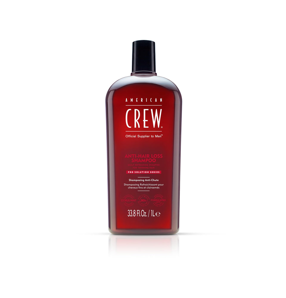 american crew bottle front view showing label and product benefit for cleaner, fuller hair