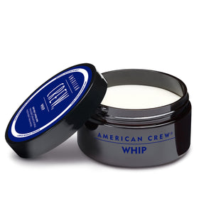 American Crew jar in bathroom setting with grooming tools, lifestyle convenience benefit