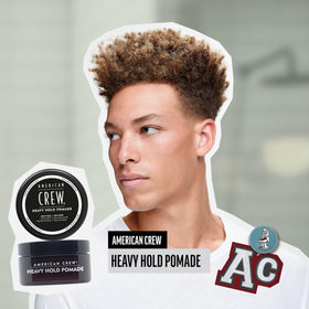 American Crew pomade jar open revealing texture for easy palm application