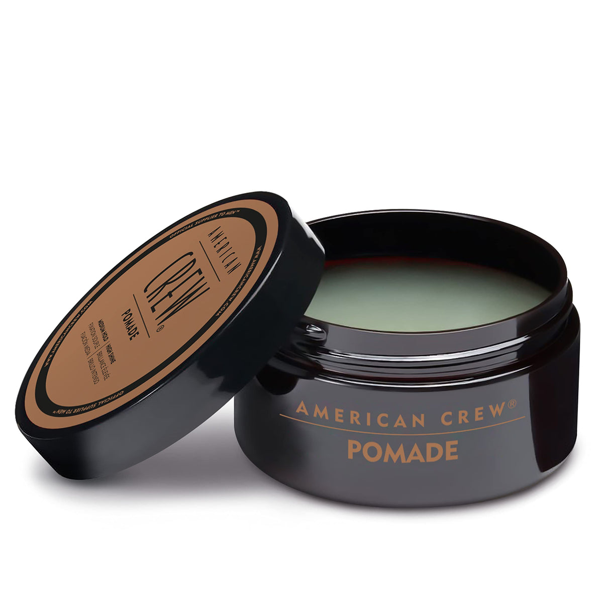 American Crew pomade label close-up highlighting product details and wash-out benefit