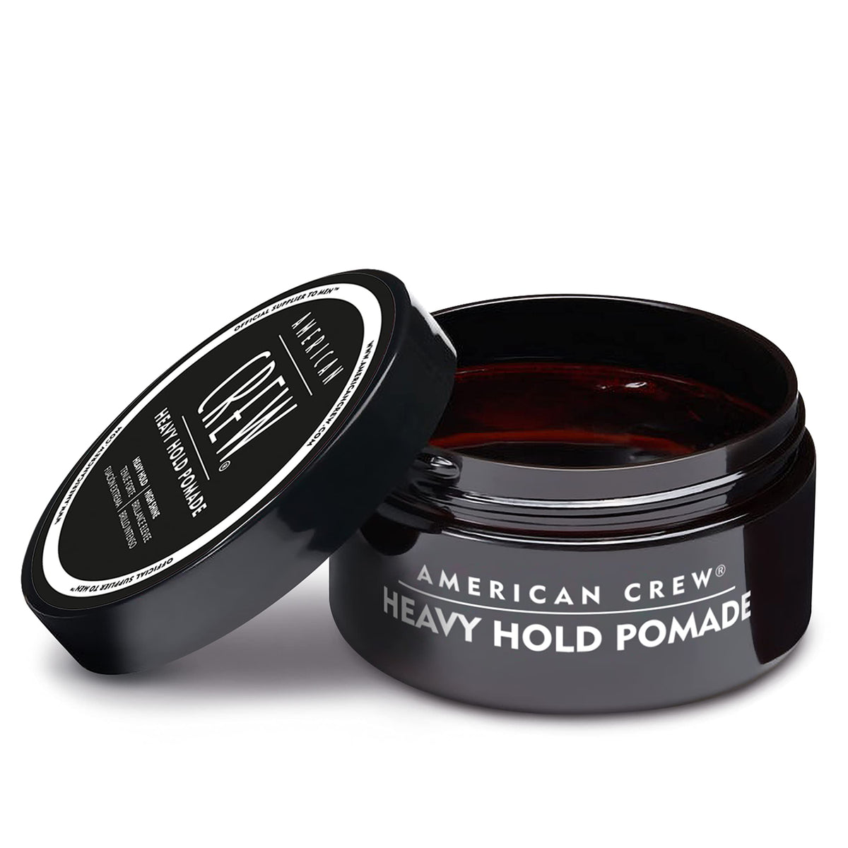 American Crew pomade on bathroom vanity staged in grooming routine setting
