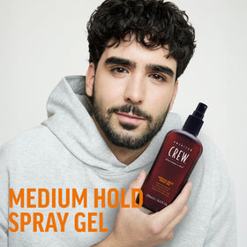 American Crew spray action over hair demonstrating even application benefit