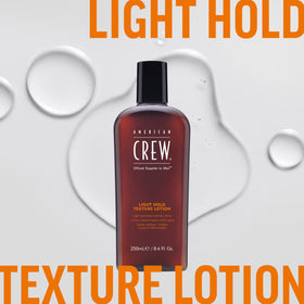 American Crew lotion on bathroom shelf conveying daily grooming routine