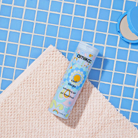 amika product in hand demonstrating 200ml size for easy comparison