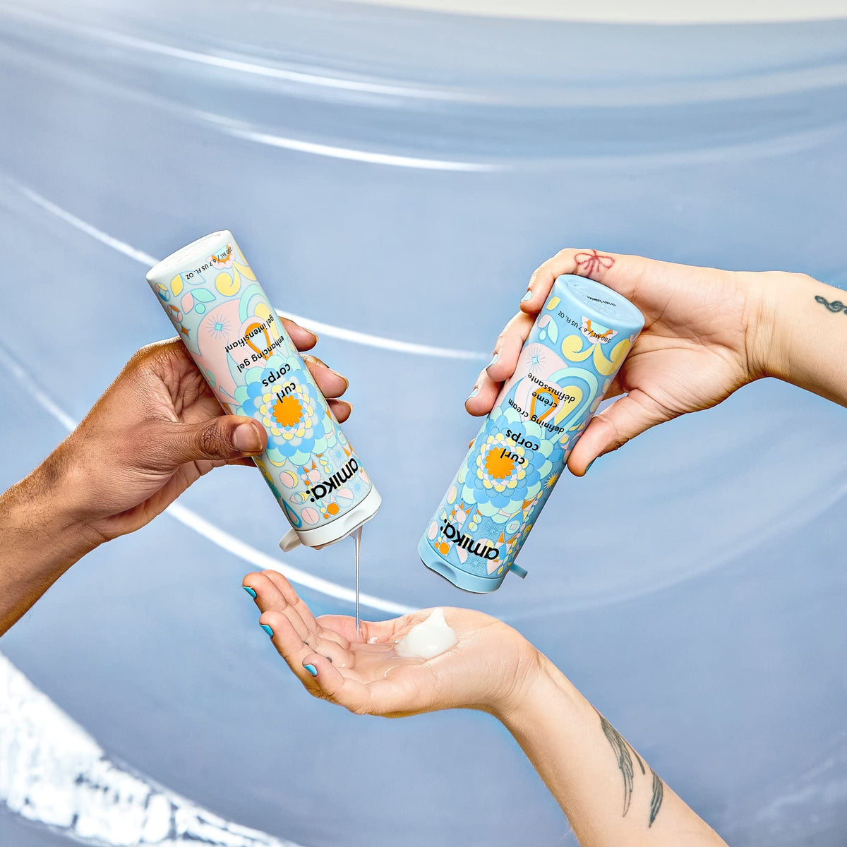 amika in-hand scale demonstrating 200ml size for travel and value visibility
