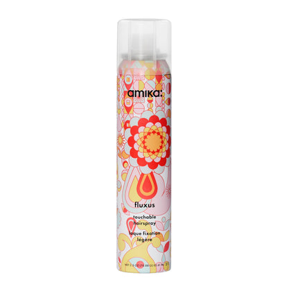 amika fluxus front can showing branding and 2.5oz portable size for travel