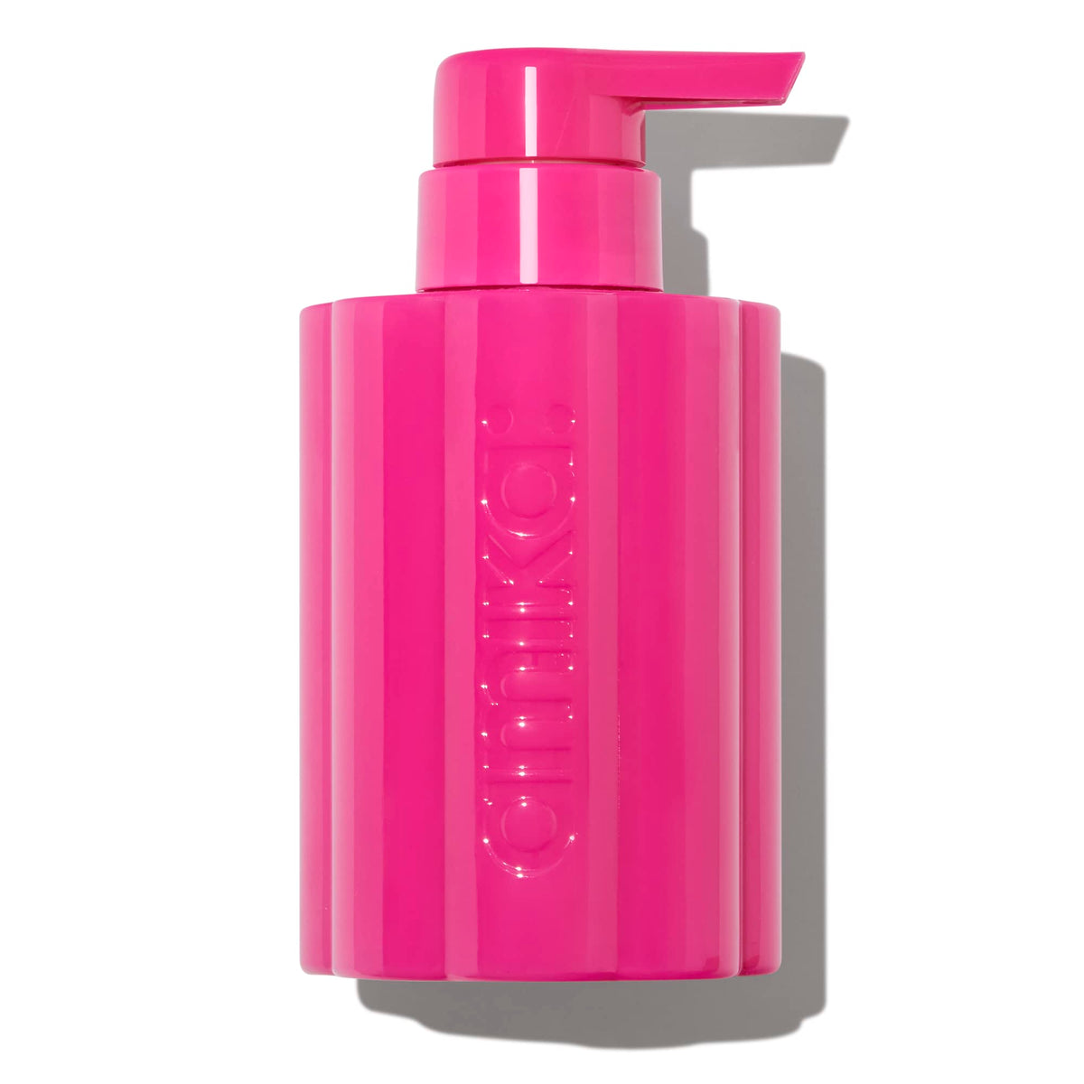amika forever friend front view clear bottle showing capacity and shower‑ready design benefit: easy refill visibility