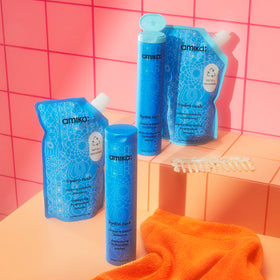 Amika creamy lather texture demonstrating gentle cleanse and hydrating foam