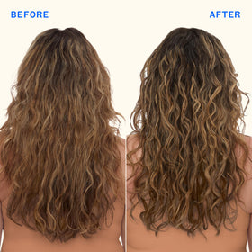Hand spraying Amika mist onto hair for quick detangling benefit