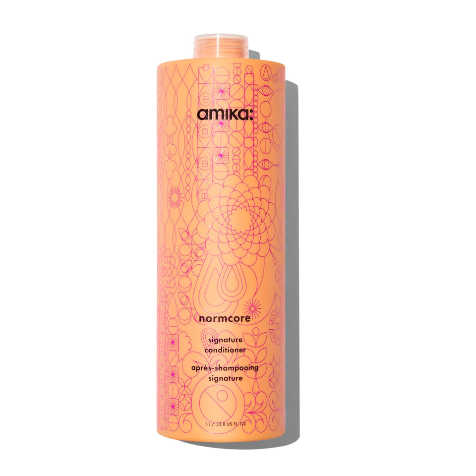 amika front bottle view showing 1000ml conditioner for lasting hydration