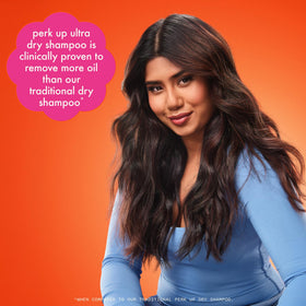 Amika on dark hair illustrating minimal residue and improved matte finish