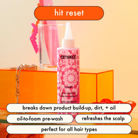 Amika Reset scalp application demonstrating massage and targeted detox