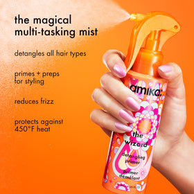 Amika The Wizard spray nozzle close-up demonstrating fine mist for even coverage