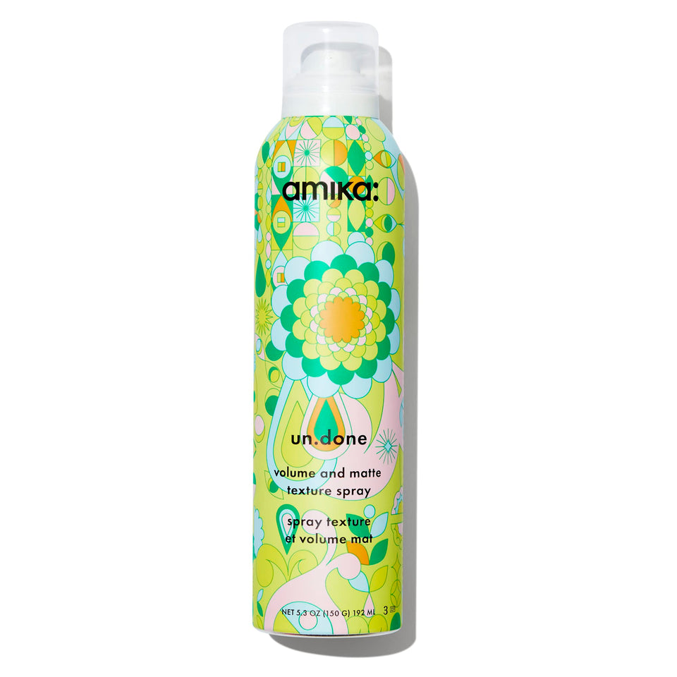 amika un.done front packaging showing the matte aerosol and brand benefit