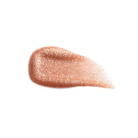 Anastasia Beverly Hills amber sparkle worn on lips in lifestyle shot showing luminous shine and fuller-looking result