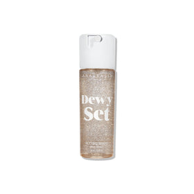 Anastasia Beverly Hills Dewy Set front bottle showing sleek label and glow benefits