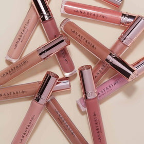 Anastasia Beverly Hills gloss placed on vanity conveying everyday luxury