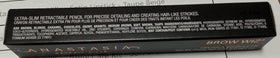 Anastasia Brow Wiz inside a makeup bag lifestyle image demonstrating portability