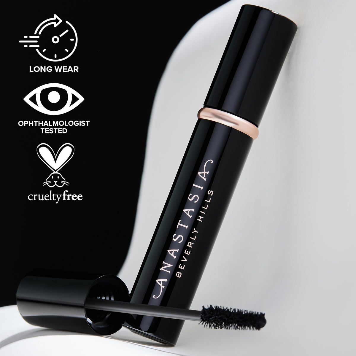 Anastasia Beverly Hills mini mascara in hand showing scale and easy portability benefit