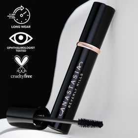 Anastasia Beverly Hills mini mascara in hand showing scale and easy portability benefit