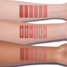 Anastasia Beverly Hills Lip Velvet next to coin shows compact travel-friendly size