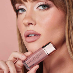 Anastasia Beverly Hills Lip Velvet swatches on arm display true-to-shade payoff