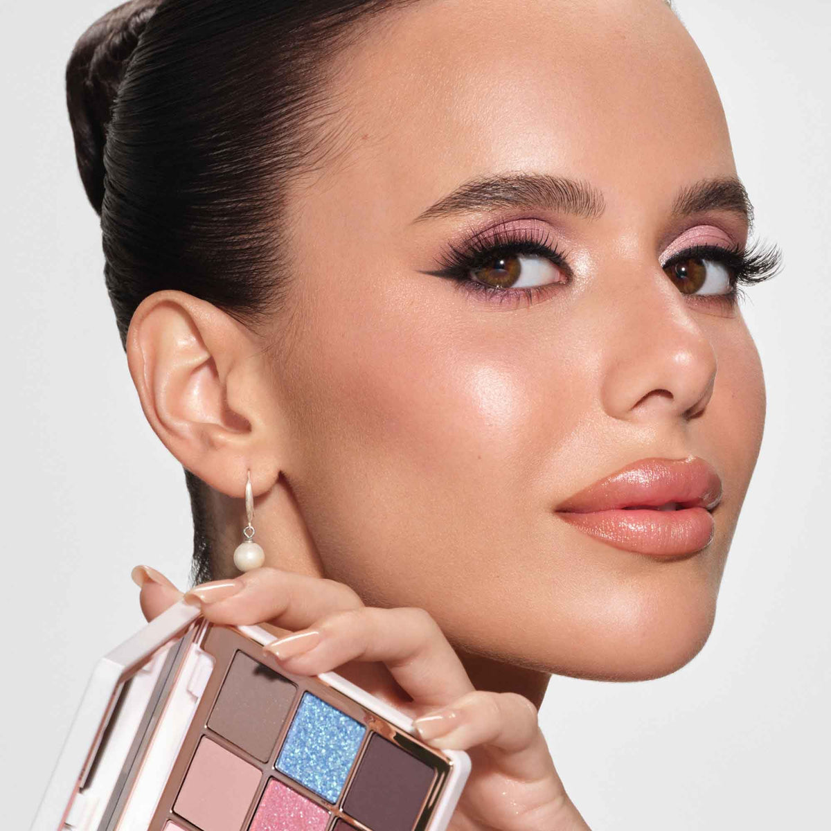 Anastasia Beverly Hills mini sugar applied on model showing cool-toned luminous look benefit