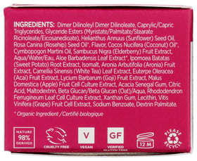 Andalou Naturals jar beside bedside items illustrating overnight treatment
