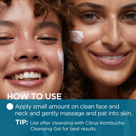 Andalou Naturals cream on fingers demonstrating easy application and non-greasy finish