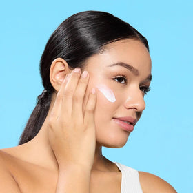 Andalou Naturals dispensing sunscreen from tube for easy daily use