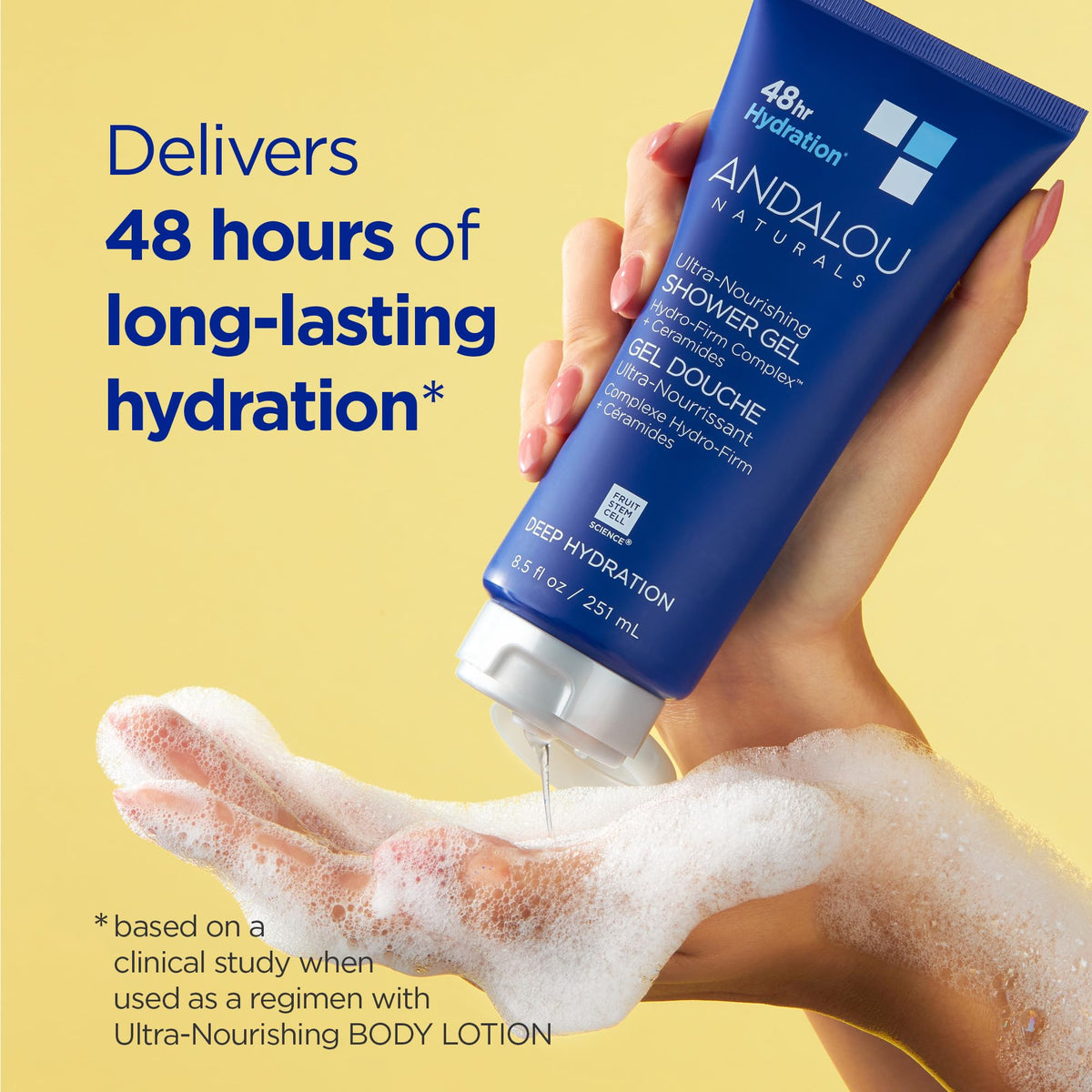 Andalou Naturals bottle held in hand to show 8.5 fl oz scale